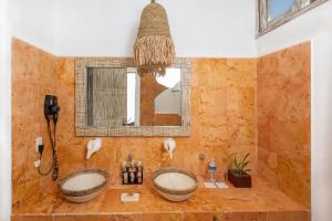 Koupelna v ubytování Holbox Dream Beachfront Hotel