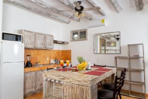 Kuchyň nebo kuchyňský kout v ubytování Holbox Dream Beachfront Hotel