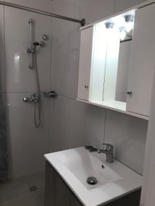 A bathroom at Banos Apartments and swimming pool