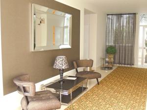 Posezení v ubytování LimaQ Hotel