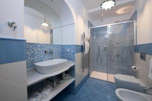 Ванная комната в Maison Don Rafe'