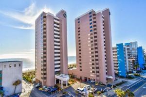 two tall buildings in a city with the ocean at Ocean Front, Private Balconies in Myrtle Beach