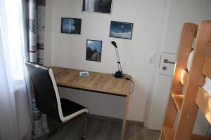 TV a/nebo společenská místnost v ubytování Ferienwohnung Palme