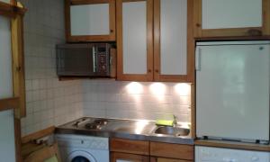 Η κουζίνα ή μικρή κουζίνα στο appartement Monetier les bains