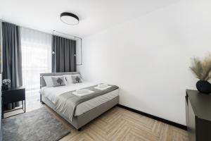 Posteľ alebo postele v izbe v ubytovaní Apartament - Kluszkowce nad Jeziorem Czorsztyńskim