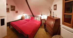 Postel nebo postele na pokoji v ubytování Apartmány U sv. Floriána