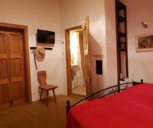 TV a/nebo společenská místnost v ubytování Apartmány U sv. Floriána