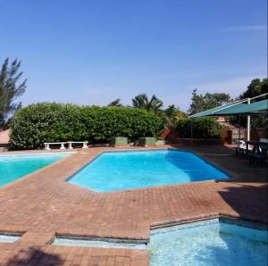 Πισίνα στο ή κοντά στο Sea view 2 bedroom home