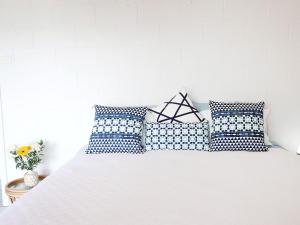 Ένα ή περισσότερα κρεβάτια σε δωμάτιο στο The Beach House +9 φωτογραφίες