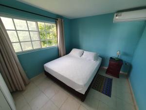 Postel nebo postele na pokoji v ubytování Apartamentos Sound Bay Beach