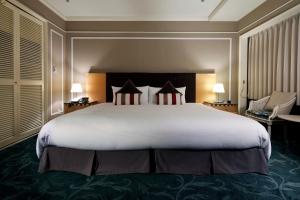 Postel nebo postele na pokoji v ubytování Hotel Allamanda Aoyama Tokyo
