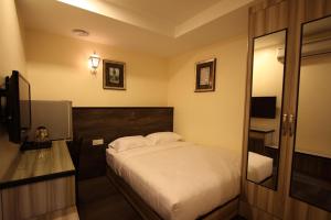Postel nebo postele na pokoji v ubytování Shamrock Guest House