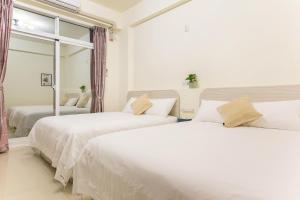 Postel nebo postele na pokoji v ubytování Square B&B