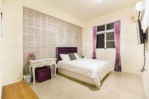 Postel nebo postele na pokoji v ubytování Square B&B