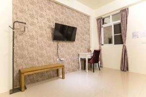 TV a/nebo společenská místnost v ubytování Square B&B