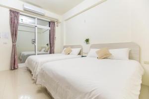 Postel nebo postele na pokoji v ubytování Square B&B
