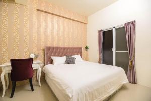 Postel nebo postele na pokoji v ubytování Square B&B