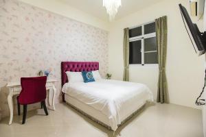 Postel nebo postele na pokoji v ubytování Square B&B