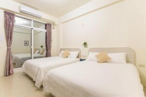 Postel nebo postele na pokoji v ubytování Square B&B