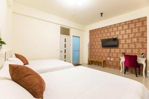 Postel nebo postele na pokoji v ubytování Square B&B
