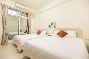 Postel nebo postele na pokoji v ubytování Square B&B