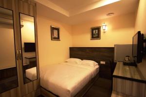 Postel nebo postele na pokoji v ubytování Shamrock Guest House