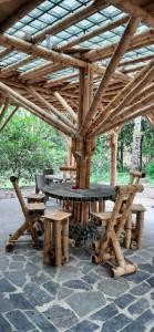 Foto sihtkohas Pacho asuva majutusasutuse Colibamboo Ecolodge Biocasa artesanal rodeada de naturaleza con jaccuzi y mucho más galeriist
