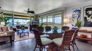 a living room with a table and chairs at Maui Eldorado - J207 in Lahaina