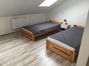 Posteľ alebo postele v izbe v ubytovaní VOTIVI