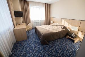 Кровать или кровати в номере Отель Виконда