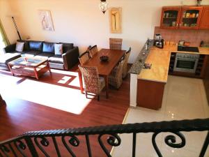 an aerial view of a living room and kitchen with a table at Budapest beauty in Budapest