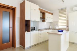 Kuchyňa alebo kuchynka v ubytovaní Apartman Niko