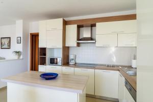 Kuchyňa alebo kuchynka v ubytovaní Apartman Niko