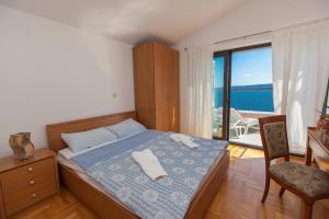 Posteľ alebo postele v izbe v ubytovaní ALANA 1 PENTHOUSE