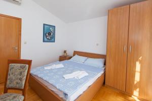 Posteľ alebo postele v izbe v ubytovaní ALANA 1 PENTHOUSE