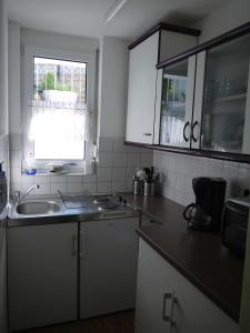Η κουζίνα ή μικρή κουζίνα στο Schwalbe Hochdorf An der Hohlgasse