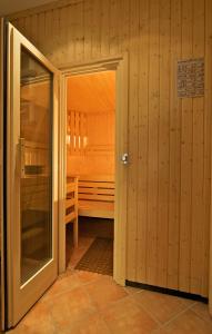 an open door to a sauna in a cabin at Rheinhotel Wagner in Kamp-Bornhofen