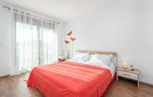 Ein Bett oder Betten in einem Zimmer der Unterkunft Apartments Spinotti