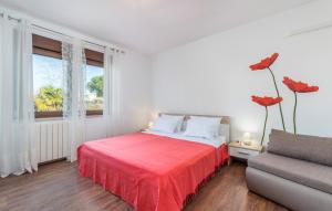 Ein Bett oder Betten in einem Zimmer der Unterkunft Apartments Spinotti