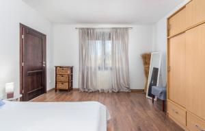 Ein Bett oder Betten in einem Zimmer der Unterkunft Apartments Spinotti