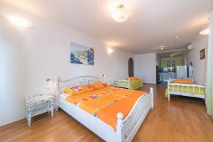 Postel nebo postele na pokoji v ubytování Adria Brela Apartments