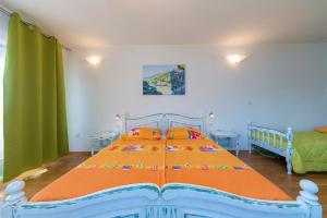 Postel nebo postele na pokoji v ubytování Adria Brela Apartments