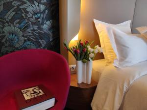 Кровать или кровати в номере Dali Hôtel Perpignan - Restaurant