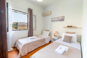 Postel nebo postele na pokoji v ubytování garden home