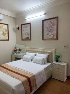Giường trong phòng chung tại hotel duclong2