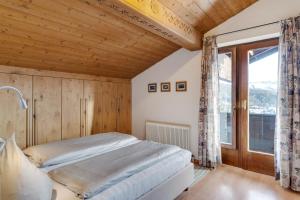 Postel nebo postele na pokoji v ubytování Apartmenthaus Jagdhof