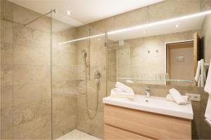 Koupelna v ubytování Apartmenthaus Jagdhof + 37 fotografií