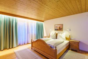 Postel nebo postele na pokoji v ubytování Apartmenthaus Jagdhof