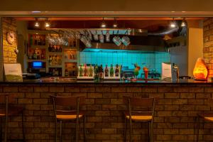 Lounge nebo bar v ubytování Angelica Hotel