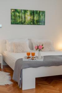 Posteľ alebo postele v izbe v ubytovaní Apartman Tragos